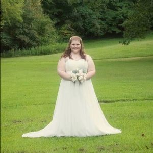 Wedding dress: Galina by Davids Bridal